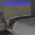 Produktbild 3 för Sänggavel LED gräddvit 200x5x118/128 cm tyg
