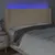 Produktbild 4 för Sänggavel LED gräddvit 203x16x118/128 cm tyg
