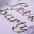 Produktbild 4 för T-shirt med långa ärmar för barn glittertext ljus lila 92