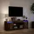 Produktbild 5 för Tv-bänk med LEDs rökfärgad ek 139,5x34x50 cm konstruerat trä